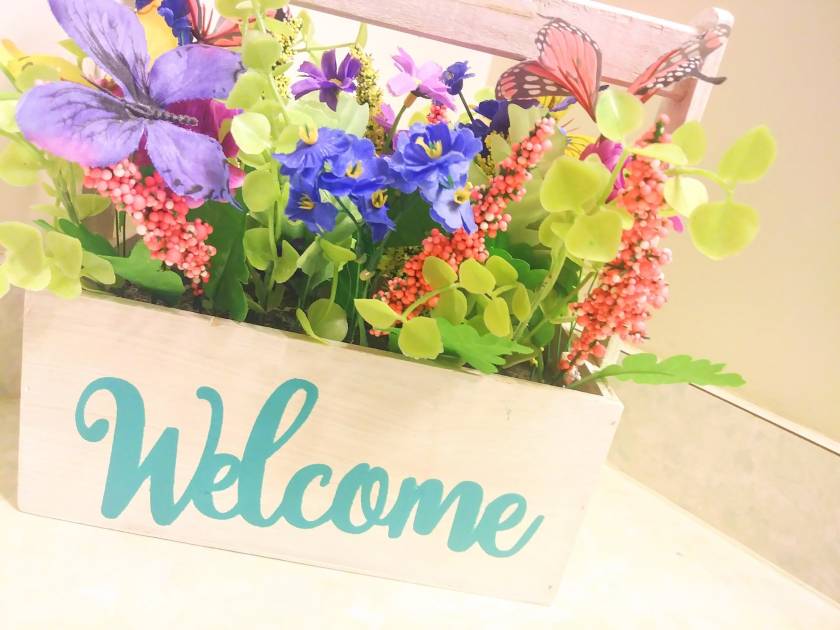 welcome basket, vacation rental, beach rental, greet guests, greeting basket, flower basket